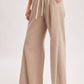 RELAXED MID-RISE FLARE KNIT PANTS