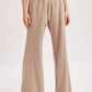 RELAXED MID-RISE FLARE KNIT PANTS