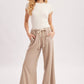 RELAXED MID-RISE FLARE KNIT PANTS