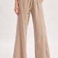 RELAXED MID-RISE FLARE KNIT PANTS